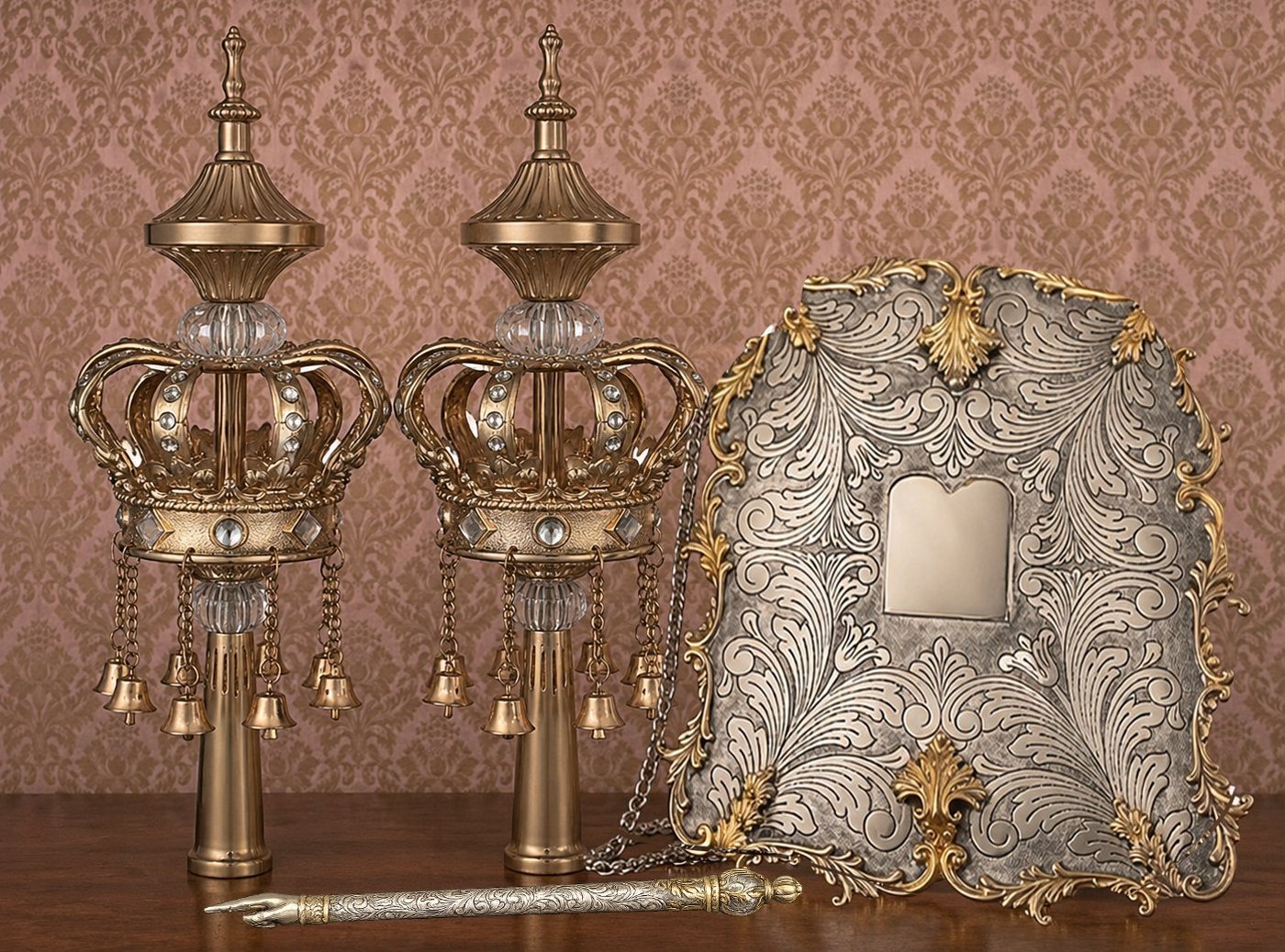 Silver Torah crowns, breastplate, and yad.